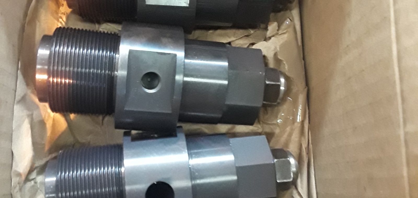 Boxed and labeled freshly-machined parts staged for scheduled replacement — A&K Machine & Fabrication, Jacksonville FL