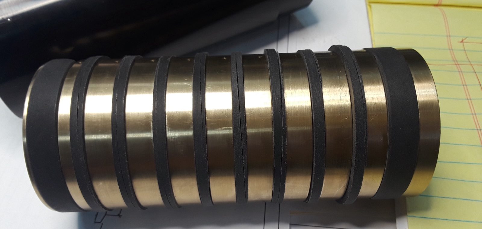 Same finned roller, alt angle showing brass contact bands — A&K Machine & Fabrication, Jacksonville FL
