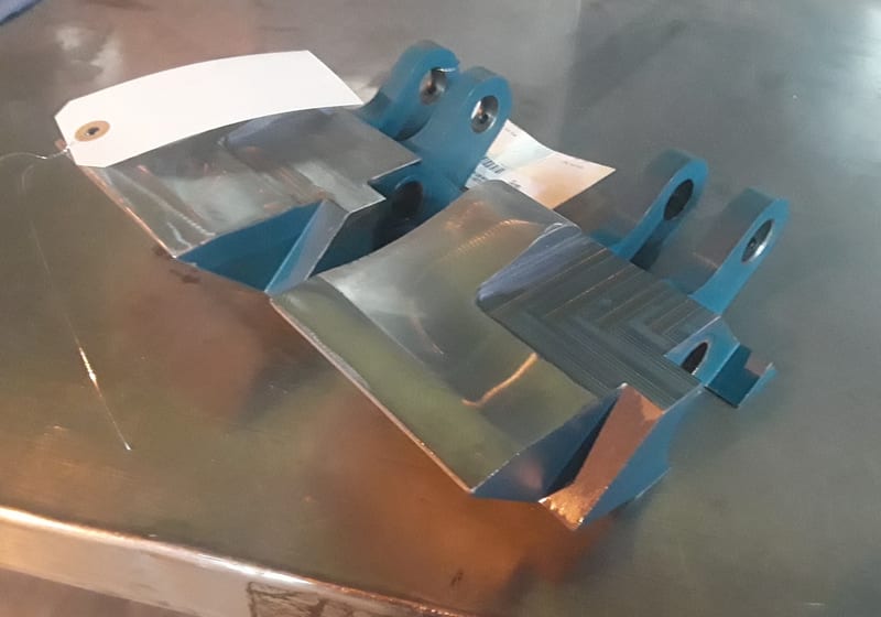 Blue painted fabricated plates — A&K Machine & Fabrication, Jacksonville FL