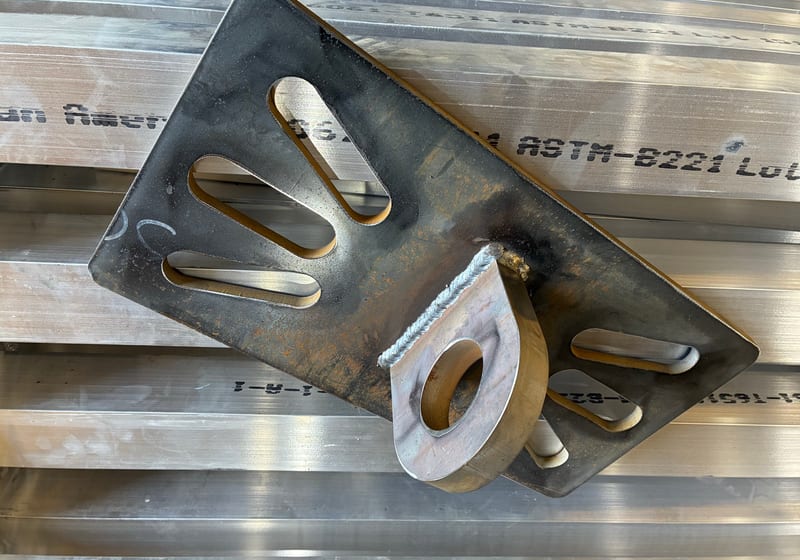 Custom cast bronze 'BUTZER MUSIC' brand plate with three cutouts - unique commission — A&K Machine & Fabrication, Jacksonville FL