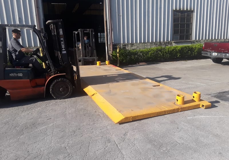 Large fabrication being moved via forklift — A&K Machine & Fabrication, Jacksonville FL