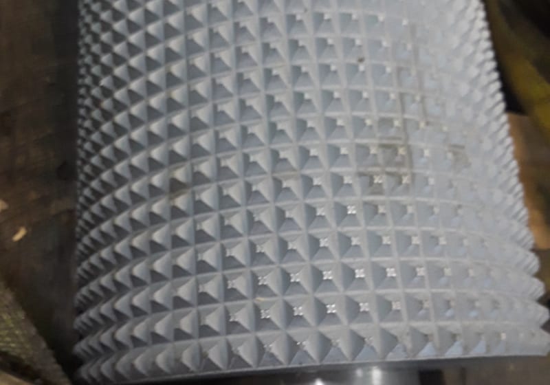 Close-up of pin-studded/knurled cylinder surface - unique pattern — A&K Machine & Fabrication, Jacksonville FL