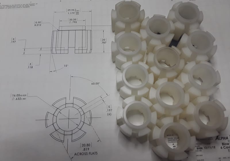 White poly bushings on engineering drawing - print-to-part pairing — A&K Machine & Fabrication, Jacksonville FL