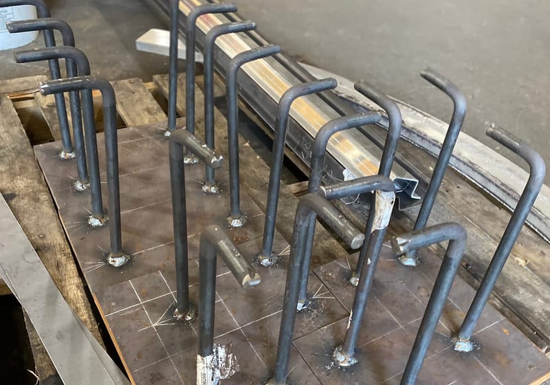 Batch of welded steel rebar concrete anchor studs with J-hooks at A&K Machine & Fabrication