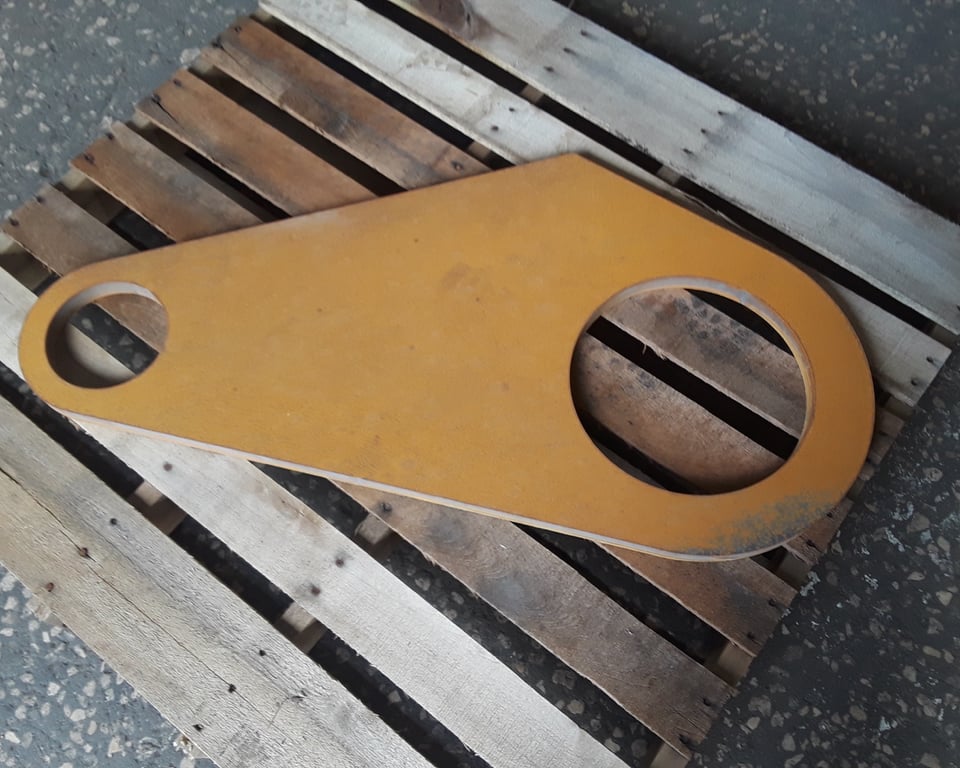 Flat machined metal plates ready for fabrication — A&K Machine & Fabrication, Jacksonville FL