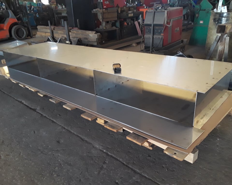 Stainless steel conveyor trough and chute components in the A&K shop — A&K Machine & Fabrication, Jacksonville FL