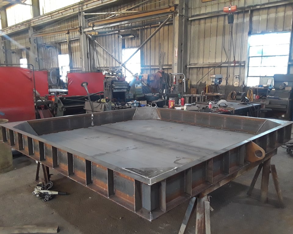Heavy fabricated steel weldment in the A&K shop ready for modernization installation — A&K Machine & Fabrication, Jacksonville FL